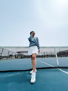 White-tennis-skirt-spring-outfit-from-rebeccaolivia
